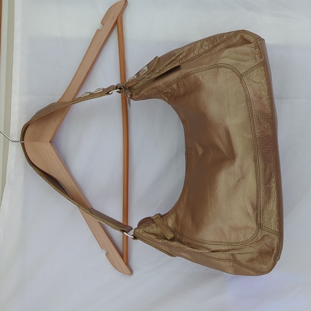 Gorgeous gold Rolfs genuine leather shoulder bag with studded detailing with zip